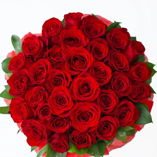 36 red roses wrapped in paper